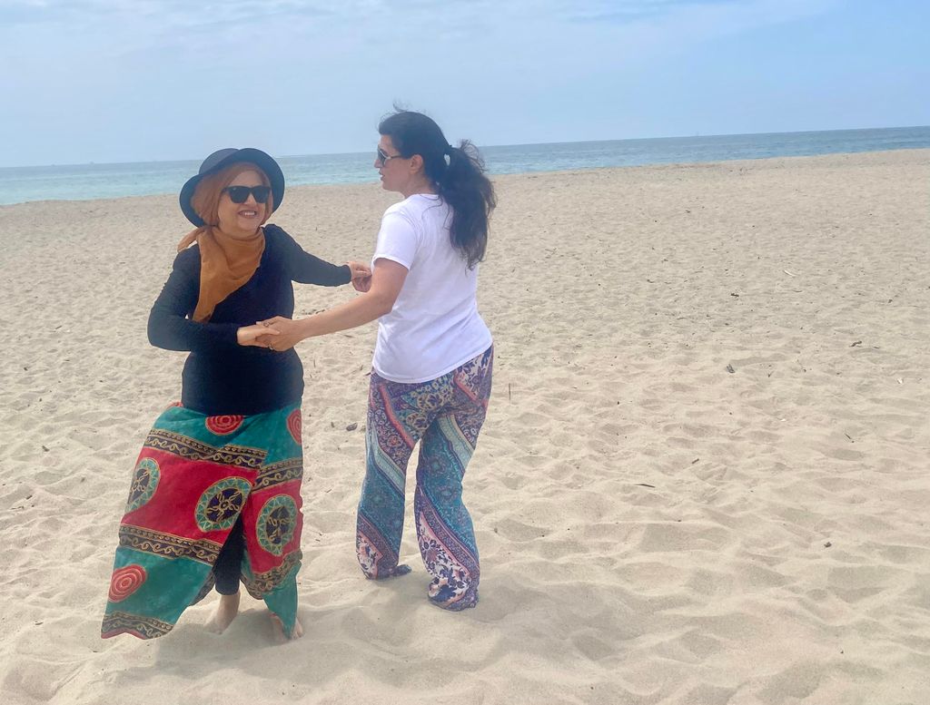 Dancing on the beach.