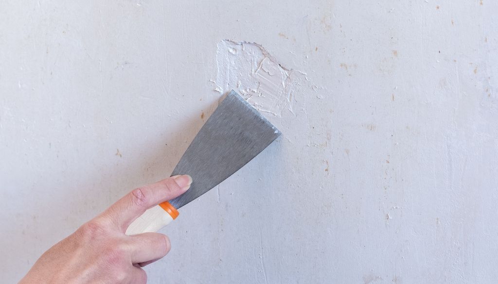 patching up paint on wall