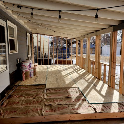 this a deck being converted into a sun room