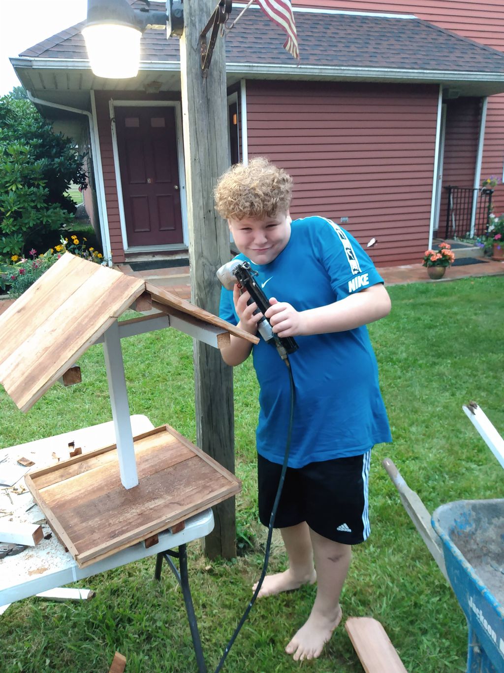my son and I building a bird feeding thing for gra
