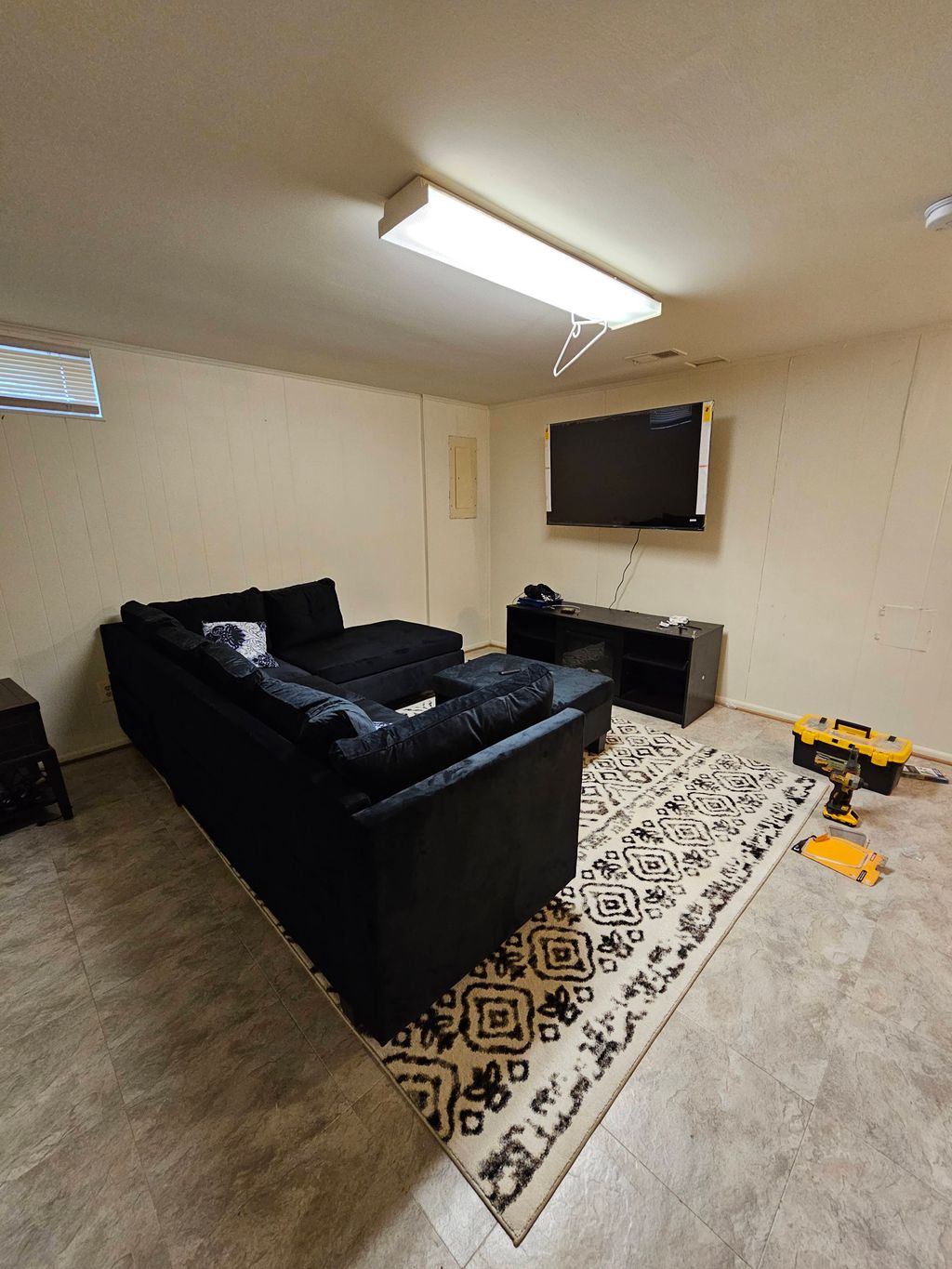 Furniture installed and television mounted.  