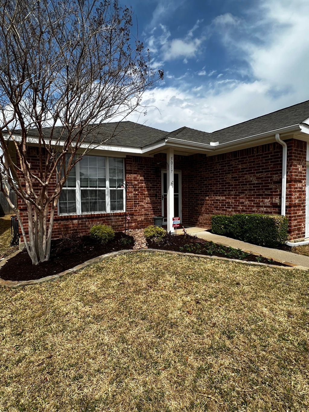 River rock bed mitigat wash out from gutters. As w