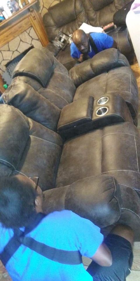 Couch being saely moved
