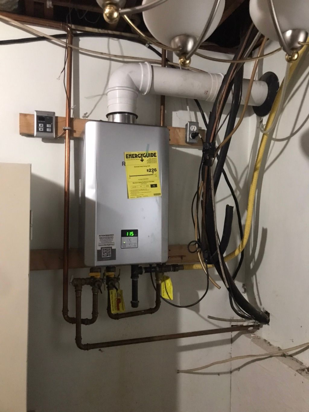 Install tankless water heater gas or electric 