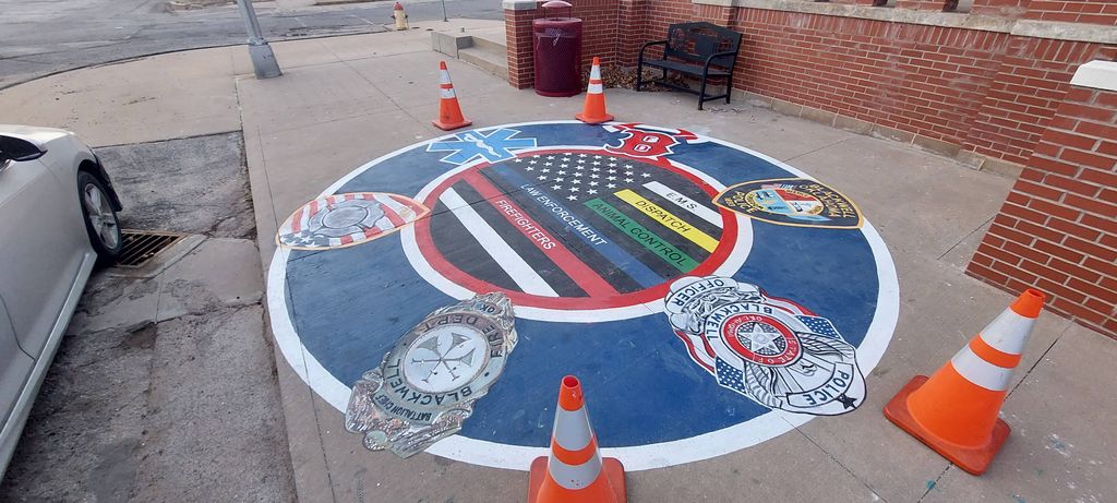 First responders sidewalk mural at Blackwell Polic