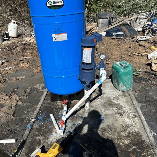 2” water well with new pump, tank and concrete sla