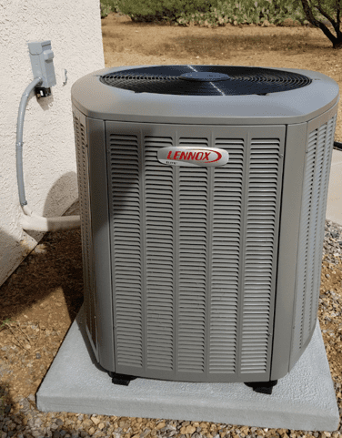 Condenser unit on pad with surge protector and pro