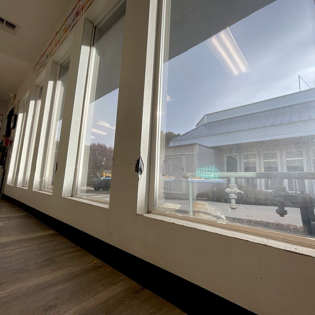 Windows in several rooms were without trim, chippe