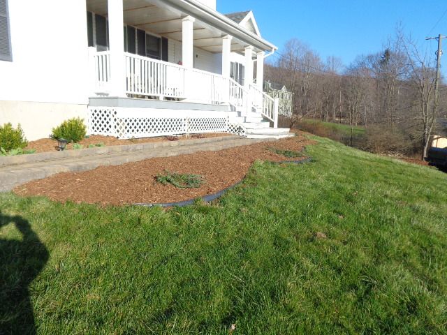 Customer mulch front garden 