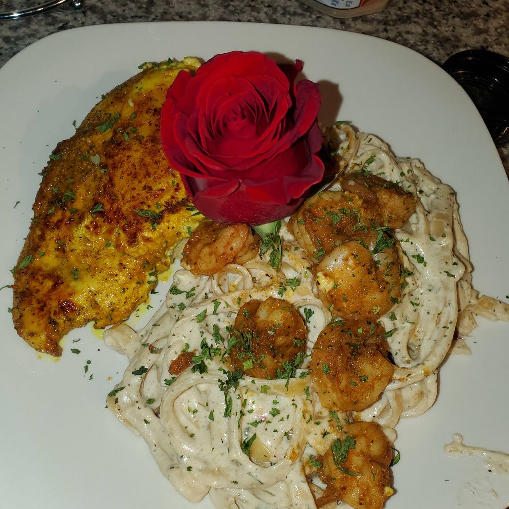 Stuffed Creamy Chicken paired w/ shrimp Alfredo 