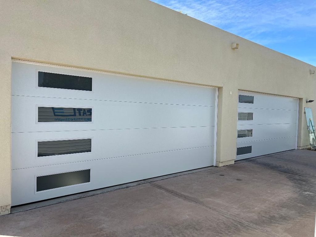 we have best prices in modern garage doors 