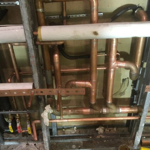 Install new copper DWV and isolation valves. New c