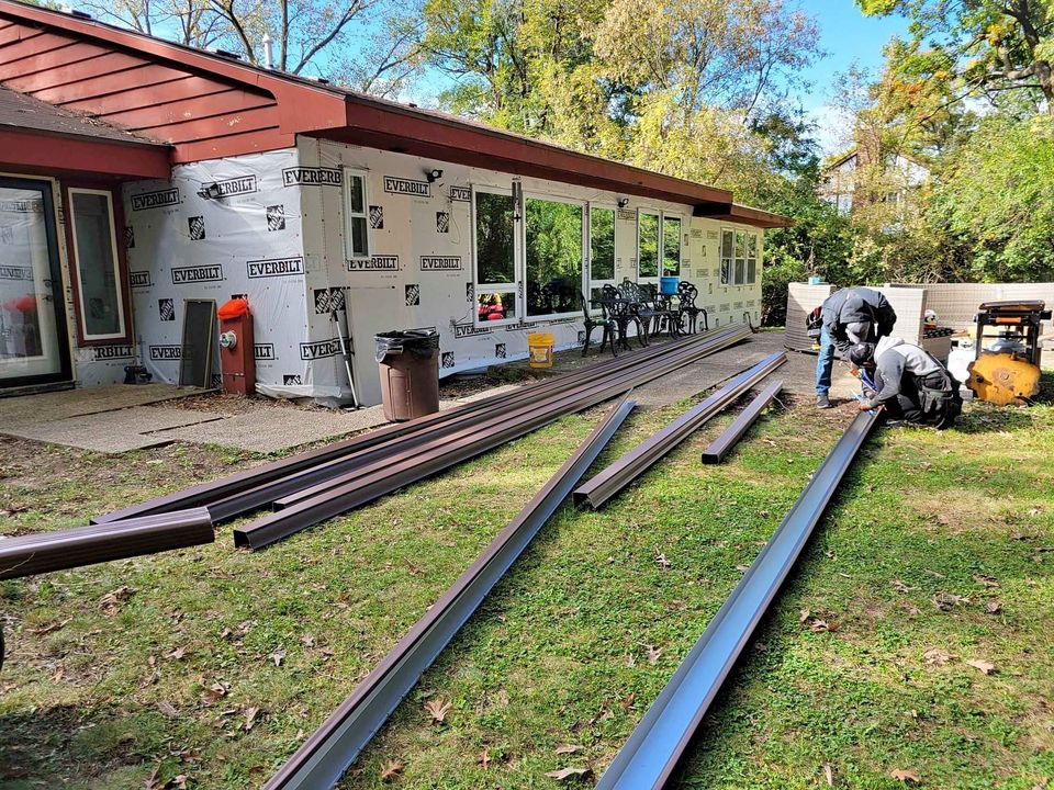 preparing siding and gutter install