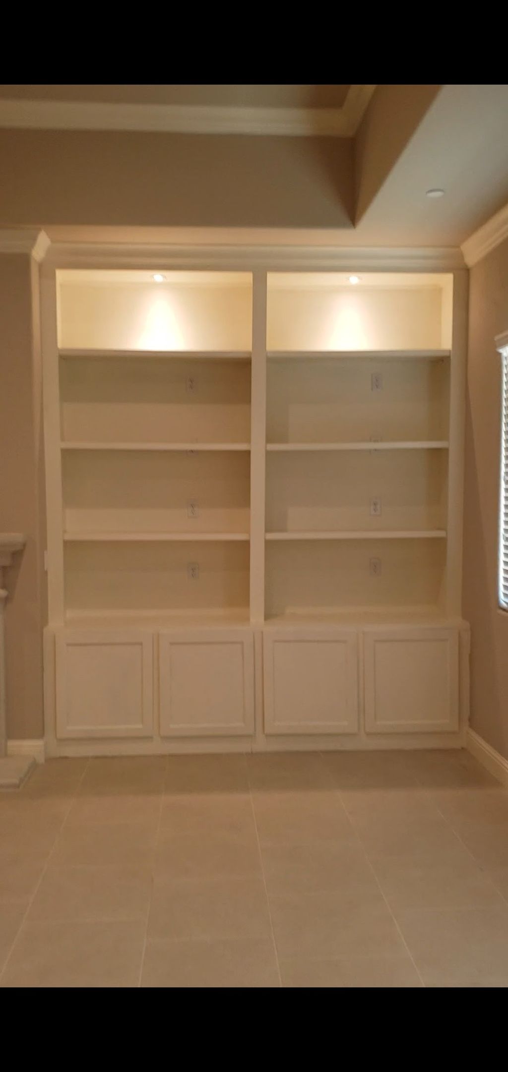 Custom built in cabinets with LED can lights