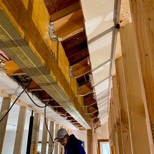 Removal of load bearing wall and installation of t