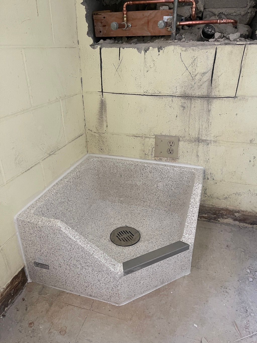 Commercial mop sink…. The wall had to be repaired 