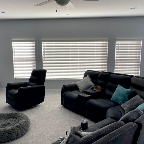 Traditional faux wood blinds with a decorative val