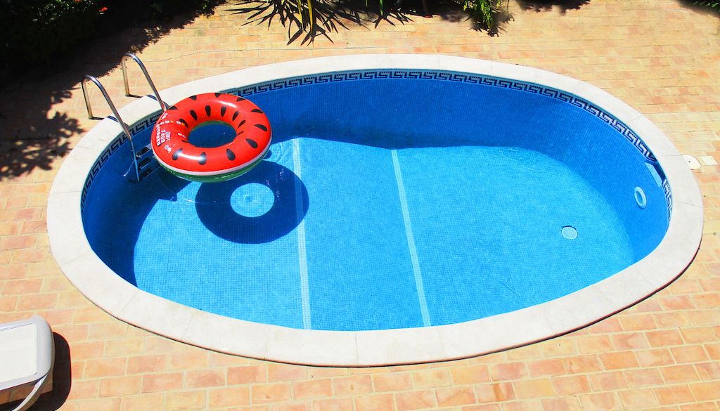 small oval inground pool