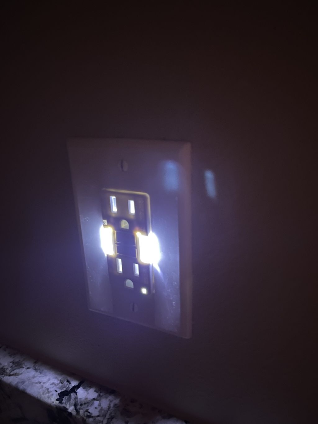 Lighted bathroom outlet install