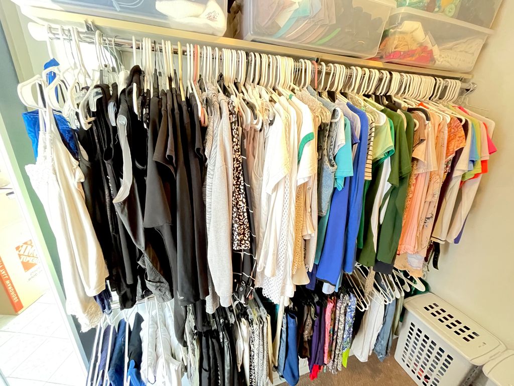 Walk in closet. Color coordinated.
