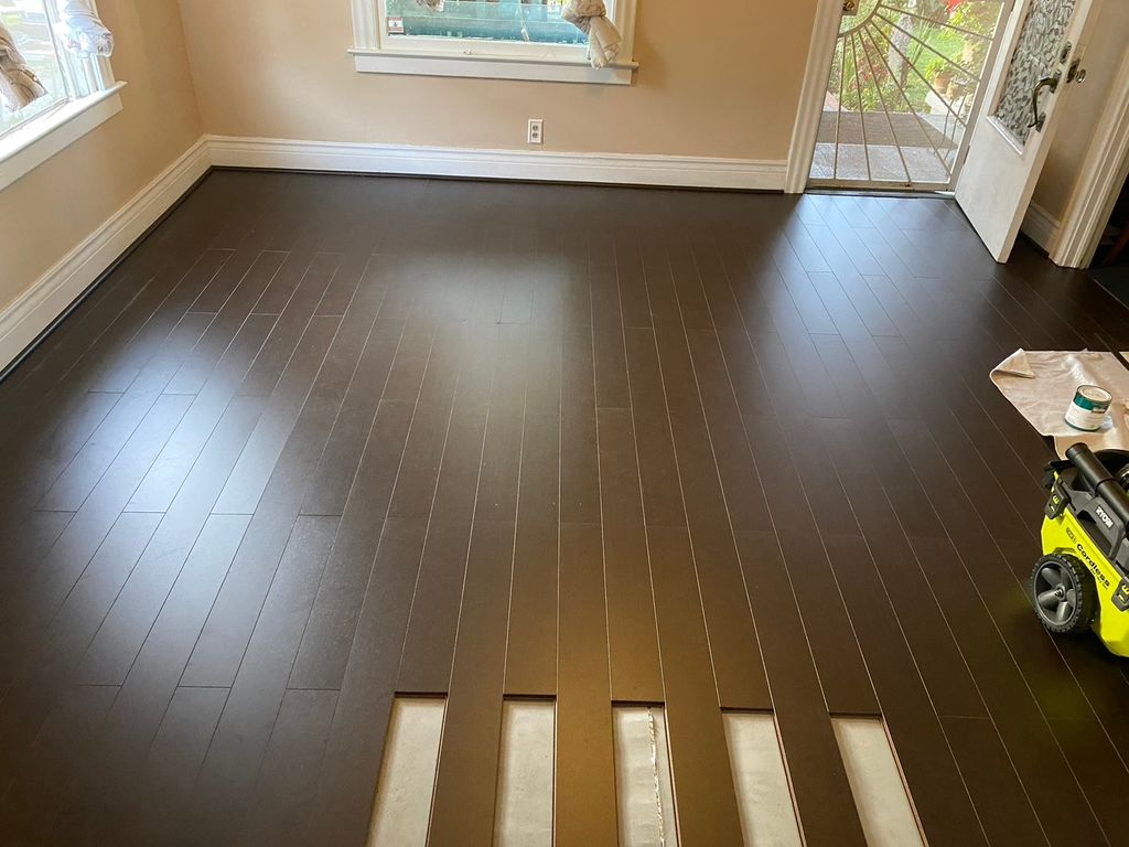 Replaced fleas infested carpeting with hard wood f