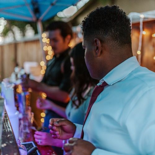 Elijah was a great bartender at our wedding. High 