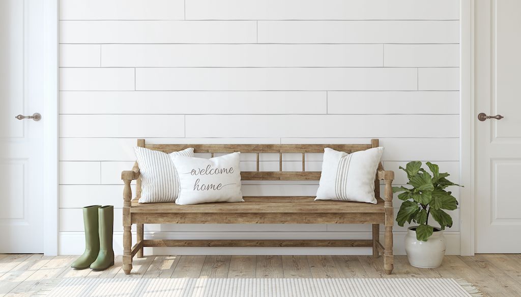 white shiplap wall panel in entryway farmhouse style