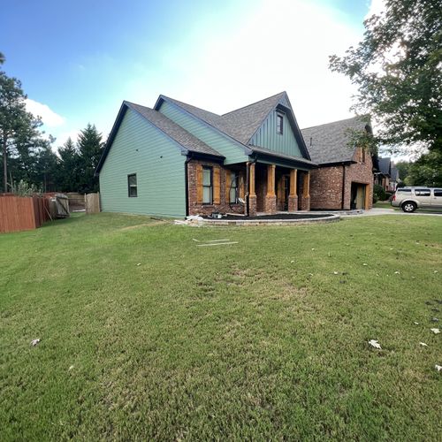 blue paint siding and brick house 
