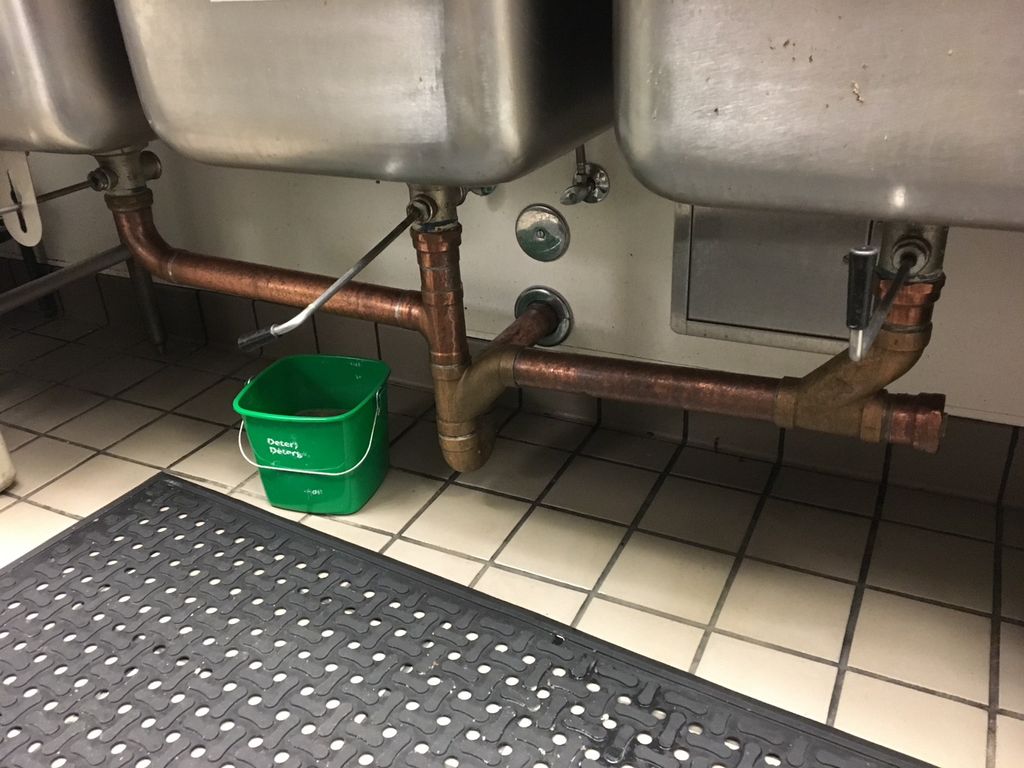 Before: leaking strainer and Drain pipe in commerc