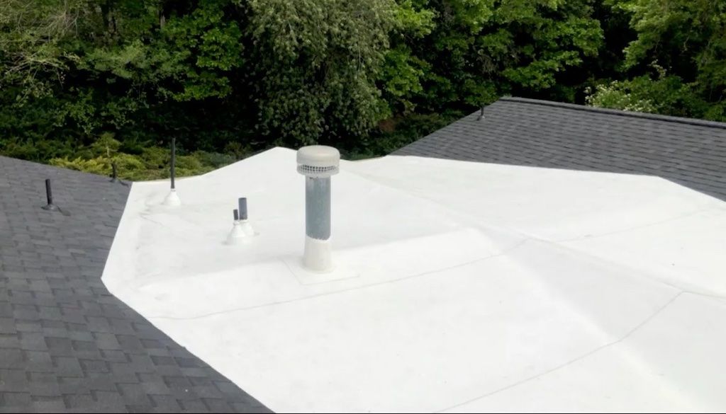 white tpo roofing on a residential home