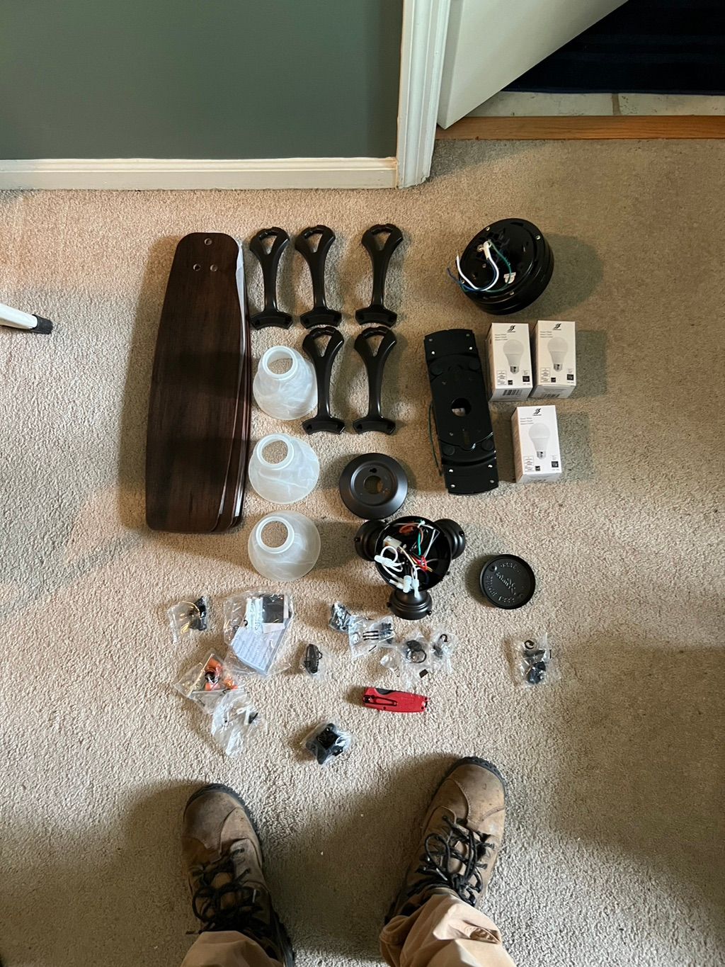 Ceiling fan installation.