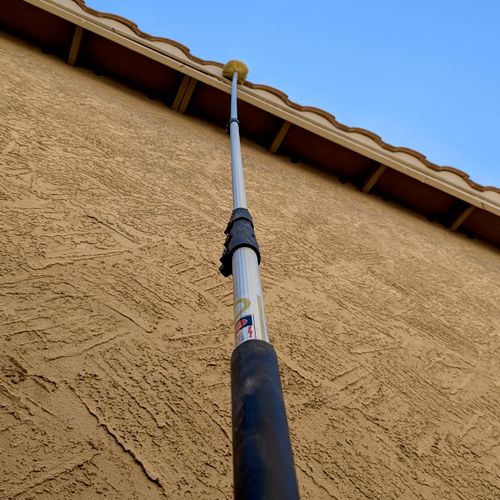 our dewebbing poles can reach 30+ ft roof lines 