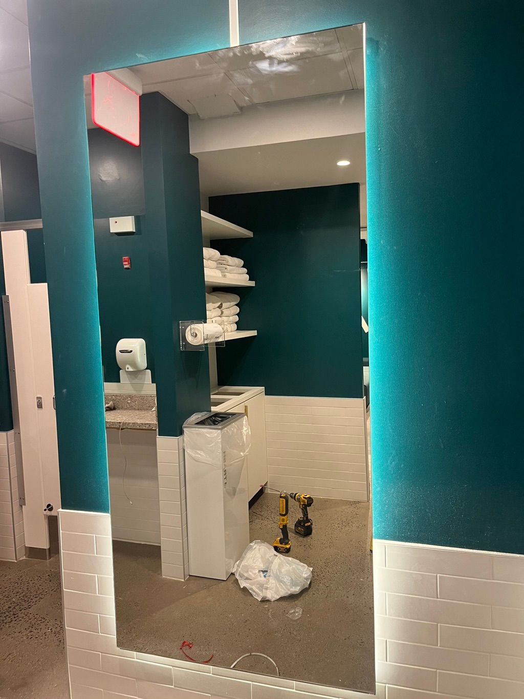 Led strip lights around mirror for commercial gym