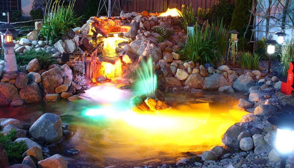 backyard water feature with neon lighting