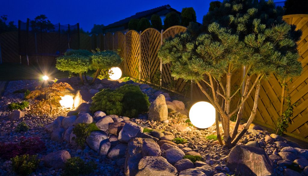 moon globe garden lights in backyard