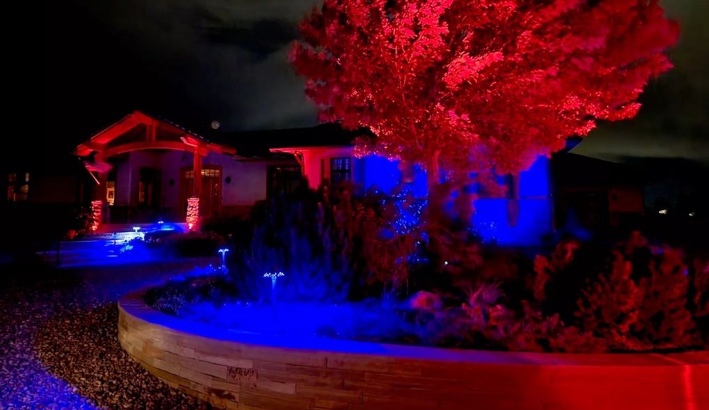 red and blue front yard landscape lighting