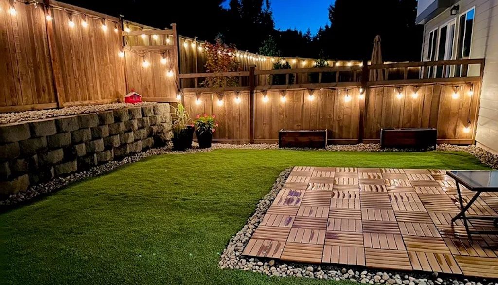 string lights on wooden backyard fence