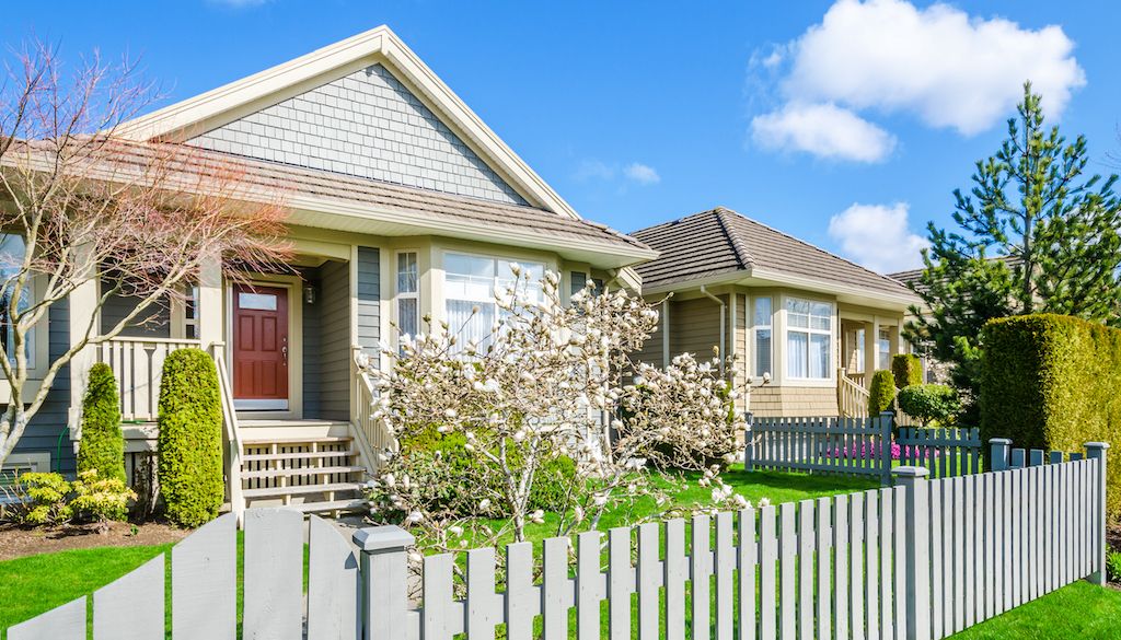 white picket fence around house