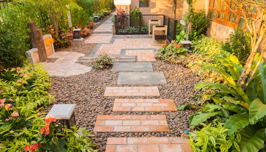 decorative garden pathway on rocks in yard