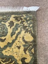 Edge repaired -reweave and fringe added
