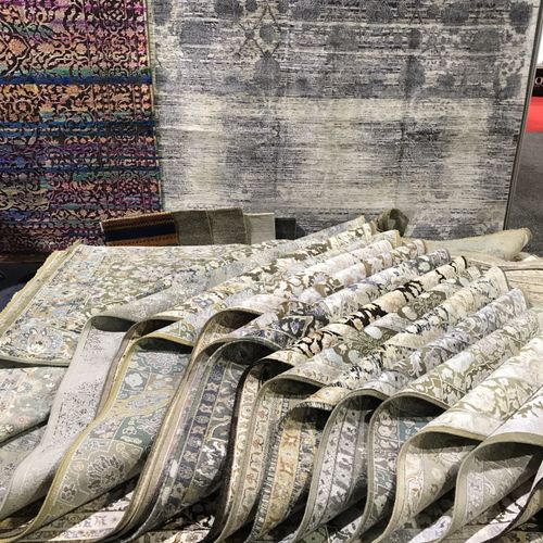 Hand-knotted rugs in store