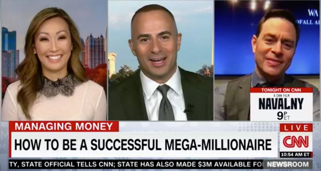 Live on CNN, Daniel Scott Johnson giving financial