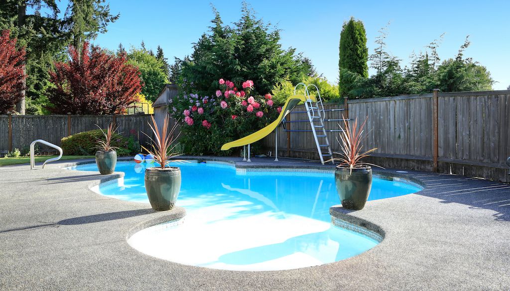 diving board near swimming pool