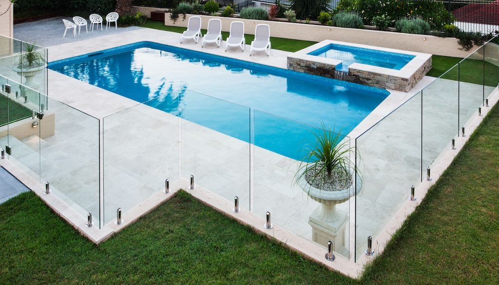 glass panel fence around pool