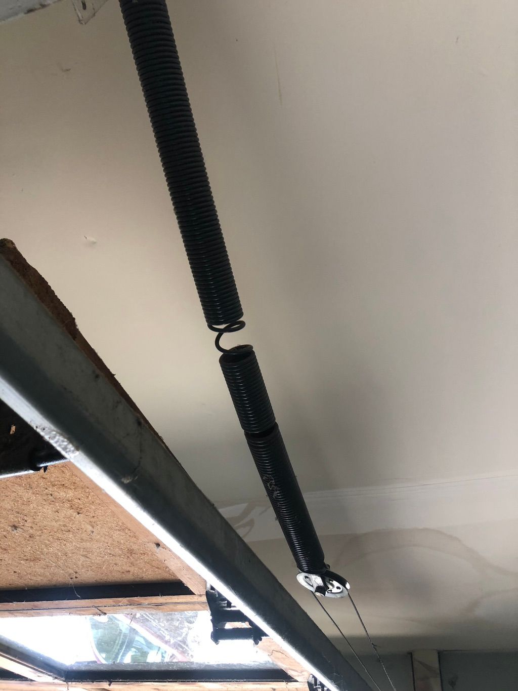 If your extension springs have gaps like this it’s