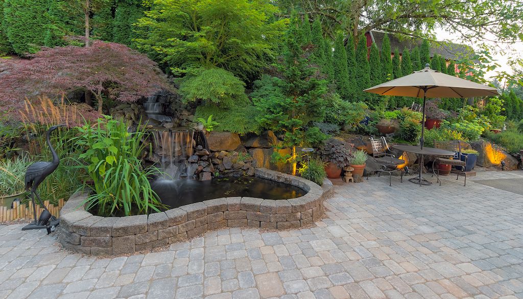 backyard with large patio and water fountain