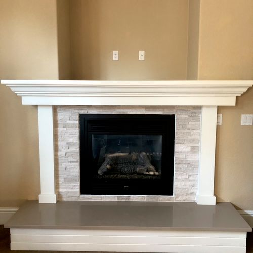 This project was a fireplace makeover.  Everything