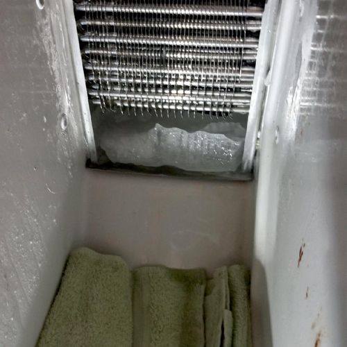 clogged drain cleaning on refrigerator 