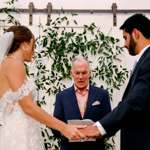 Me officiating my daughter's wedding.