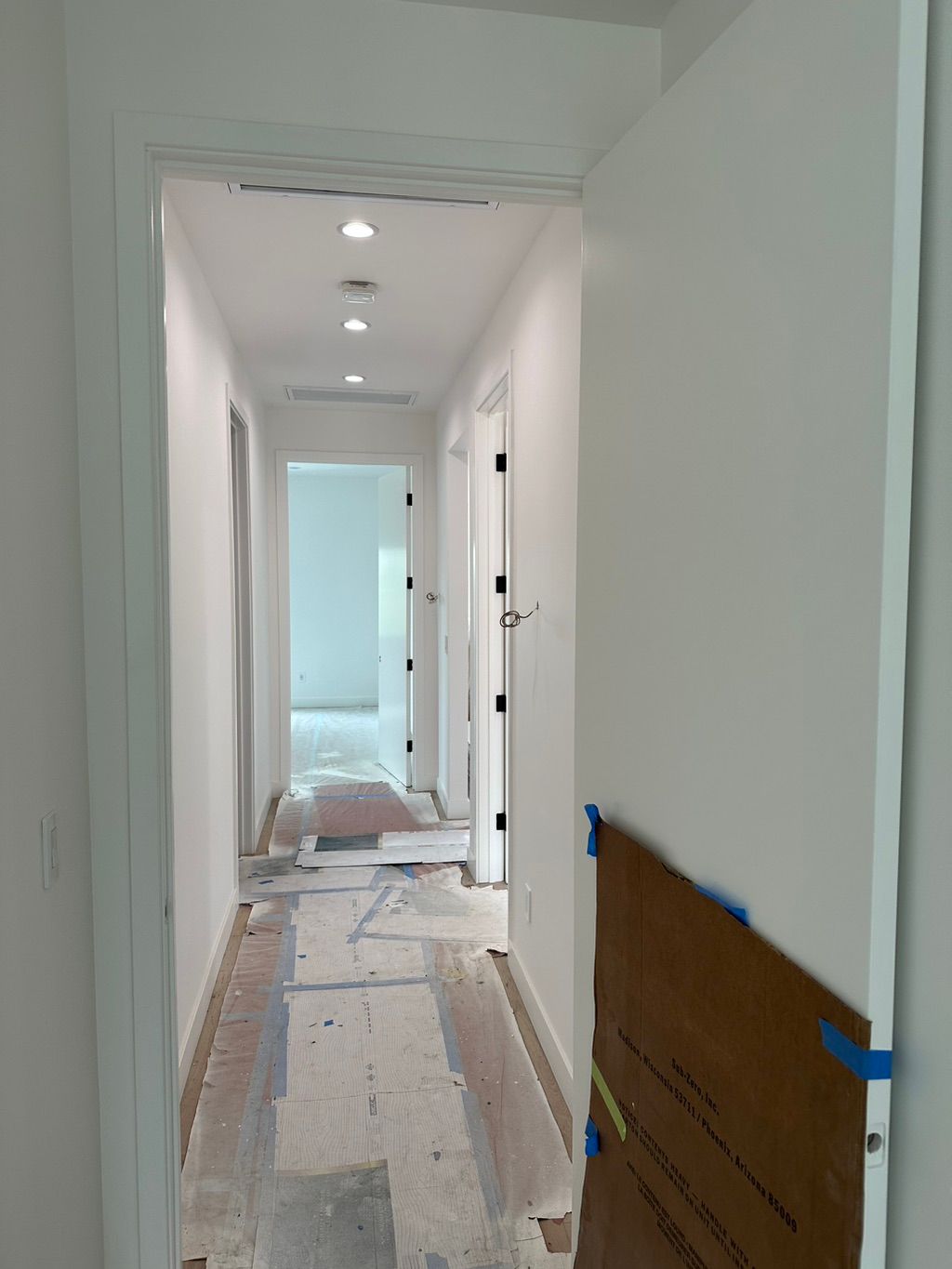 Painted walls, installed doors, installed recessed